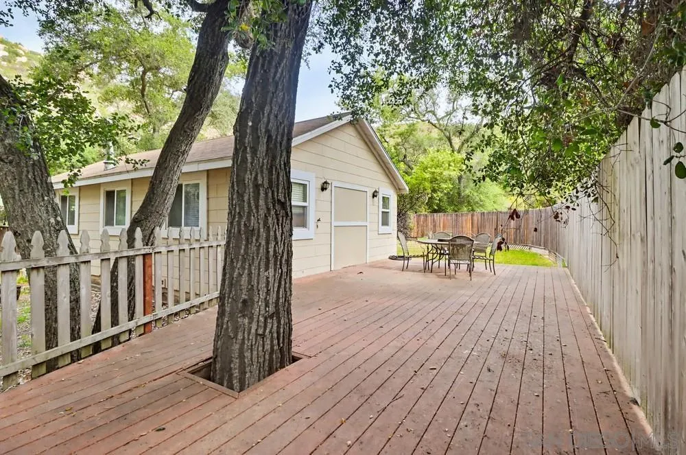 2275 Honey Springs Road Jamul, CA 91935 - Photo 16 of 17 a house that has a tree in it