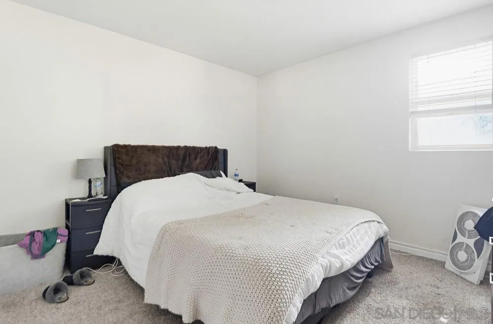 2275 Honey Springs Road Jamul, CA 91935 - Photo 7 of 17 a bedroom with a bed and a window