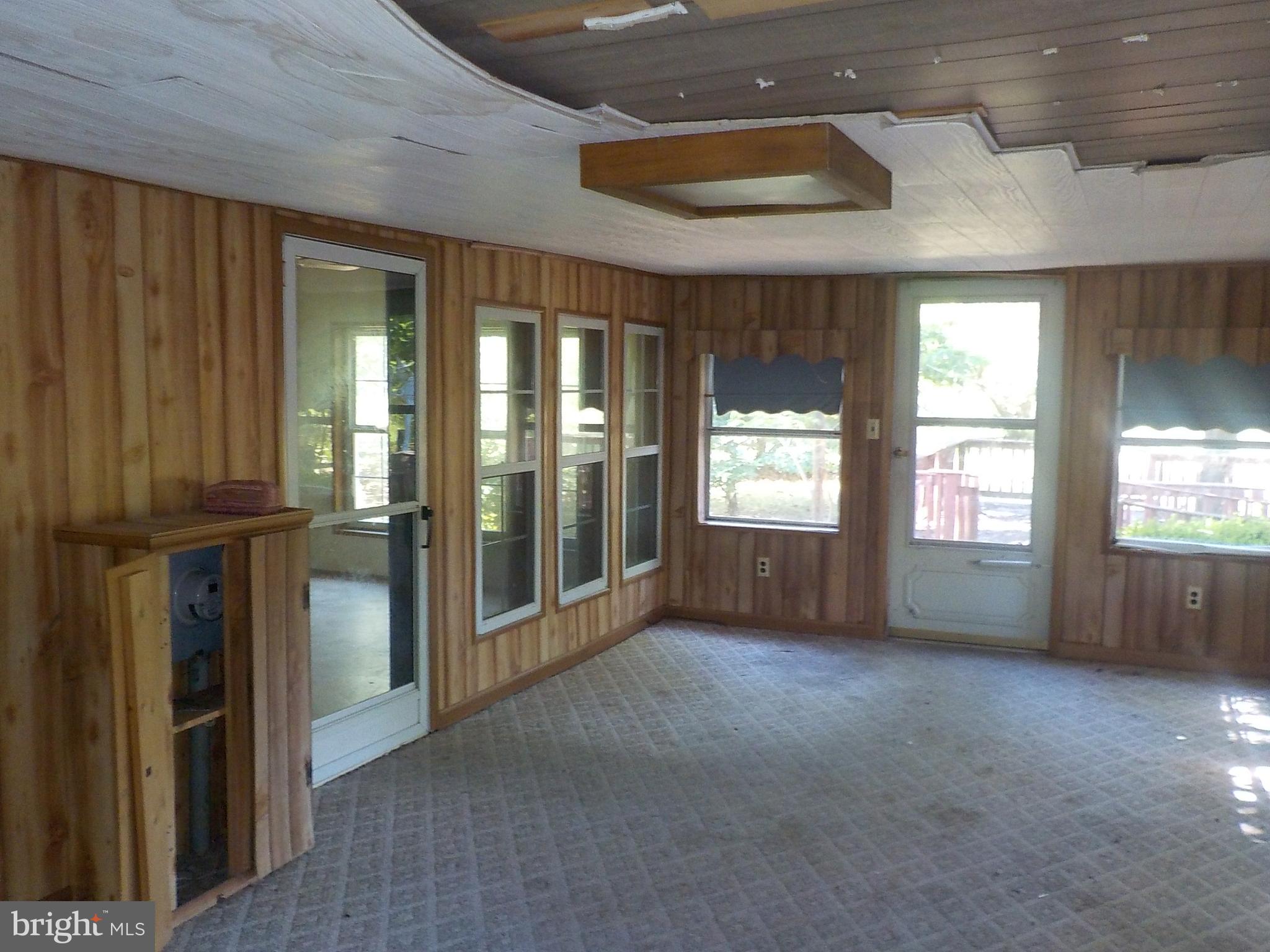 2240 Elliott Island Road Vienna, MD 21869 - Photo 14 of 26 Enclosed porch