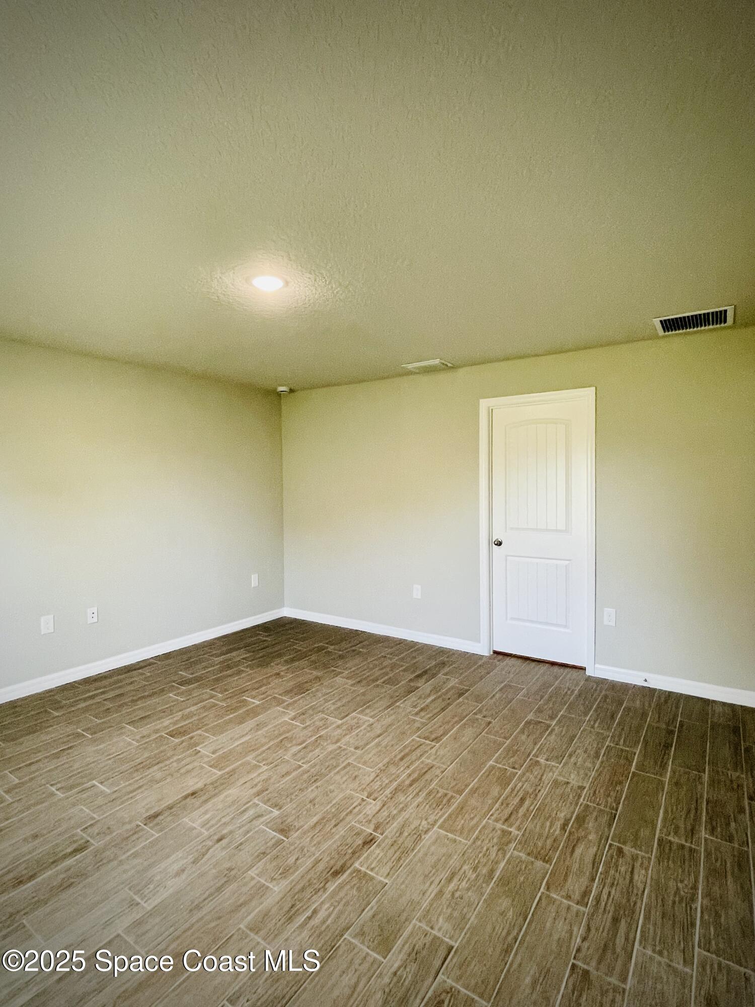 334 Frederick Street Southwest Palm Bay, FL 32908 - Photo 25 of 39 a view of an empty room