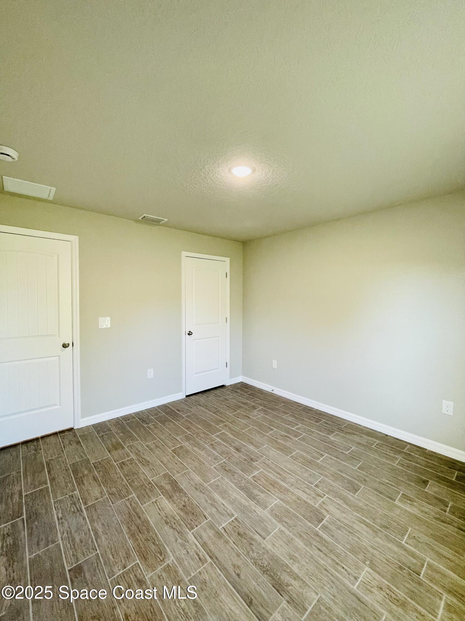 334 Frederick Street Southwest Palm Bay, FL 32908 - Photo 27 of 39 a view of an empty room