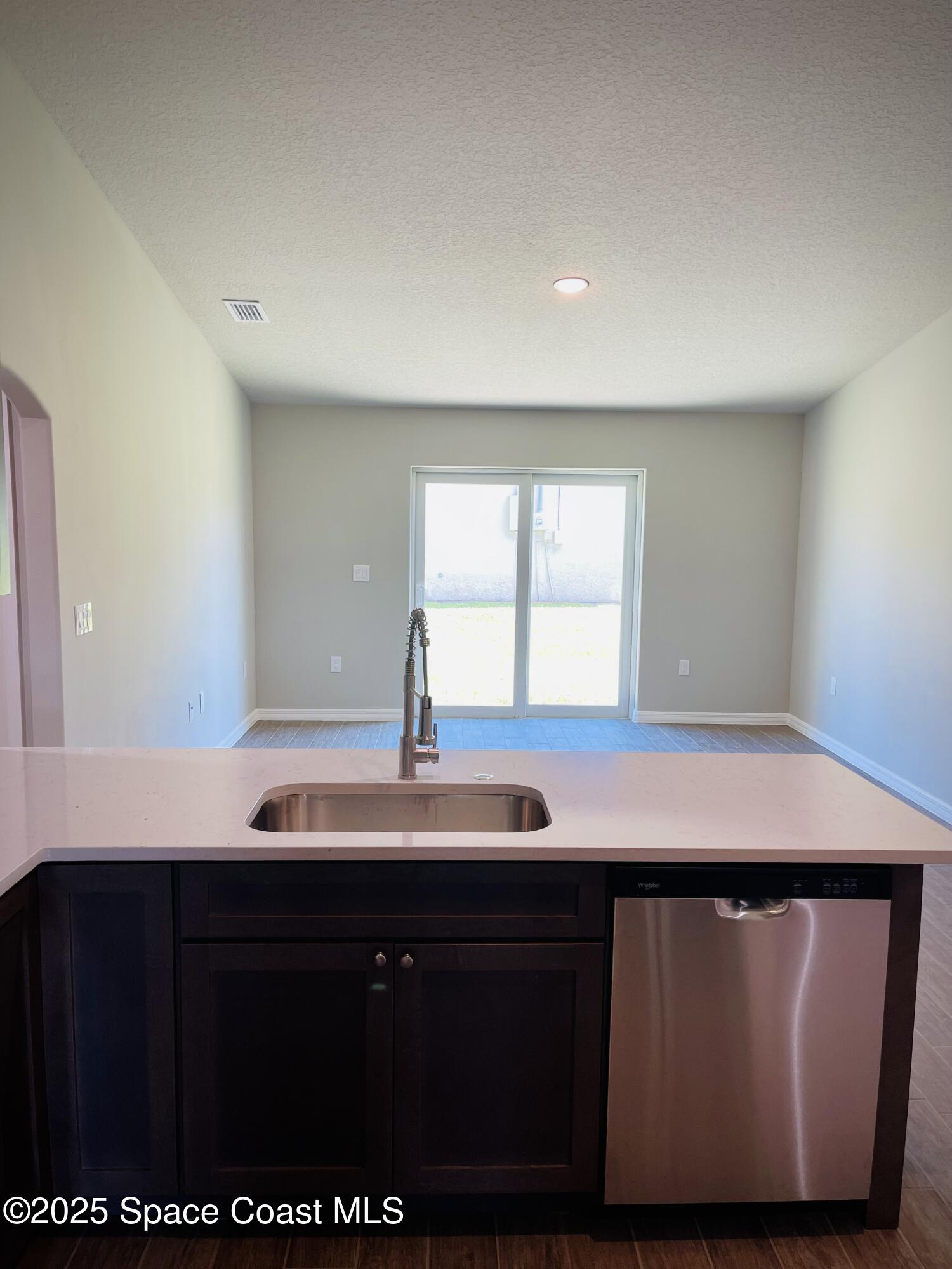 334 Frederick Street Southwest Palm Bay, FL 32908 - Photo 34 of 39 a view of room with two sinks and a window