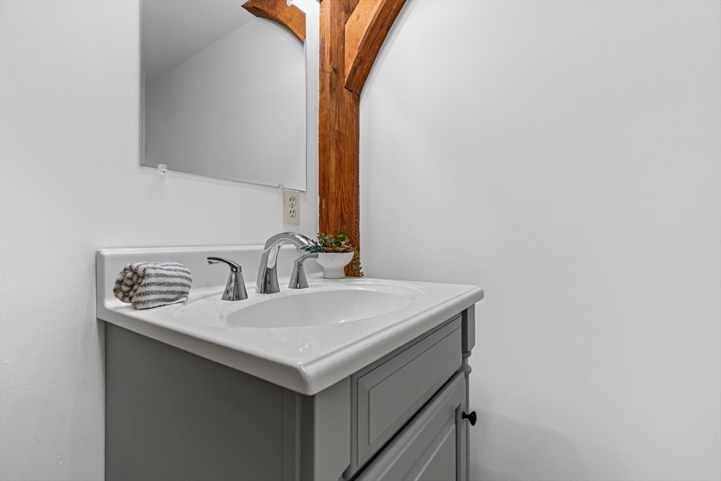 51 Worcester Road New Braintree, MA 01531 - Photo 13 of 39 a bathroom with a sink and a mirror
