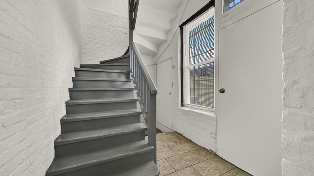 2913 West 63rd Street Chicago, IL 60629 - Photo 11 of 23 a view of staircase with white walls and windows