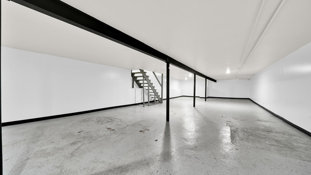 2913 West 63rd Street Chicago, IL 60629 - Photo 20 of 23 a view of a hallway with stairs