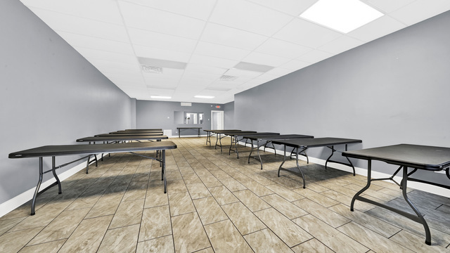 2913 West 63rd Street Chicago, IL 60629 - Photo 2 of 23 a hallway with table and chairs