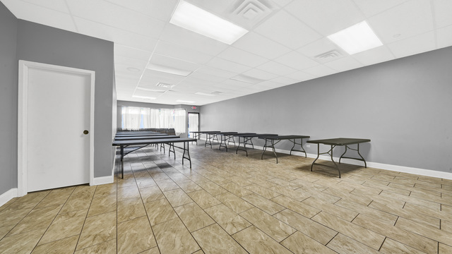 2913 West 63rd Street Chicago, IL 60629 - Photo 5 of 23 a view of a kitchen with a sink and cabinets