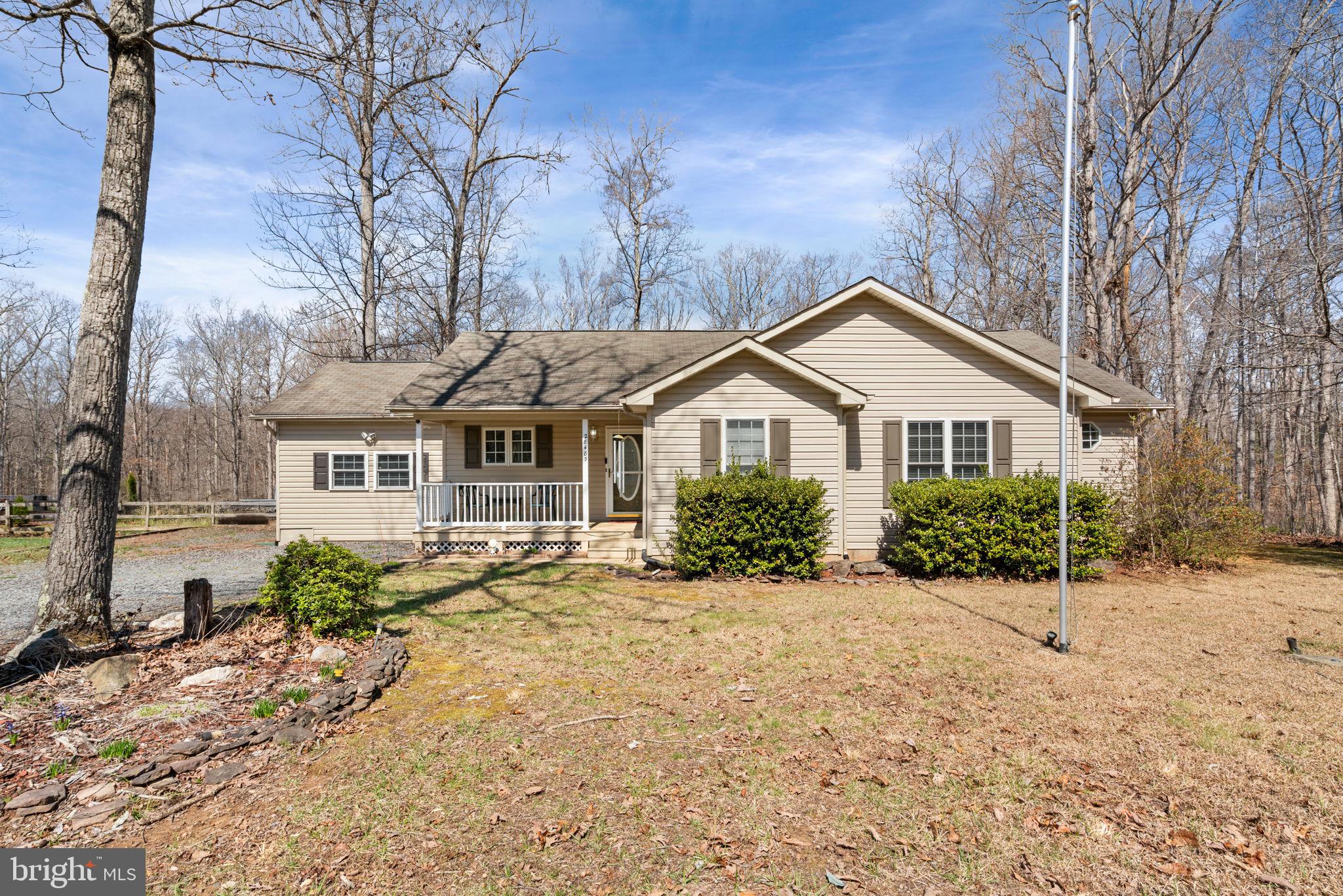 28485 Morel Way Rhoadesville, VA 22542 - Photo 2 of 42 a front view of a house with a yard