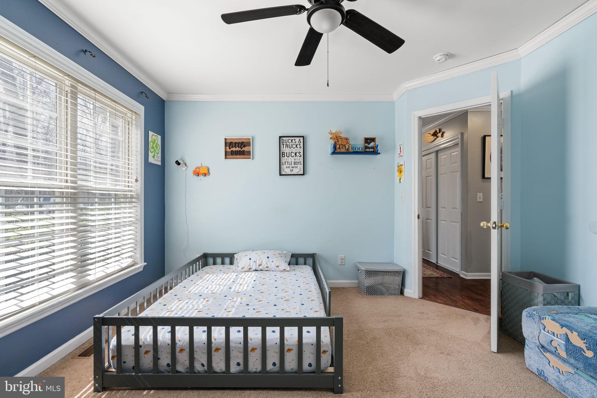 28485 Morel Way Rhoadesville, VA 22542 - Photo 31 of 42 a bedroom with a bed and a window
