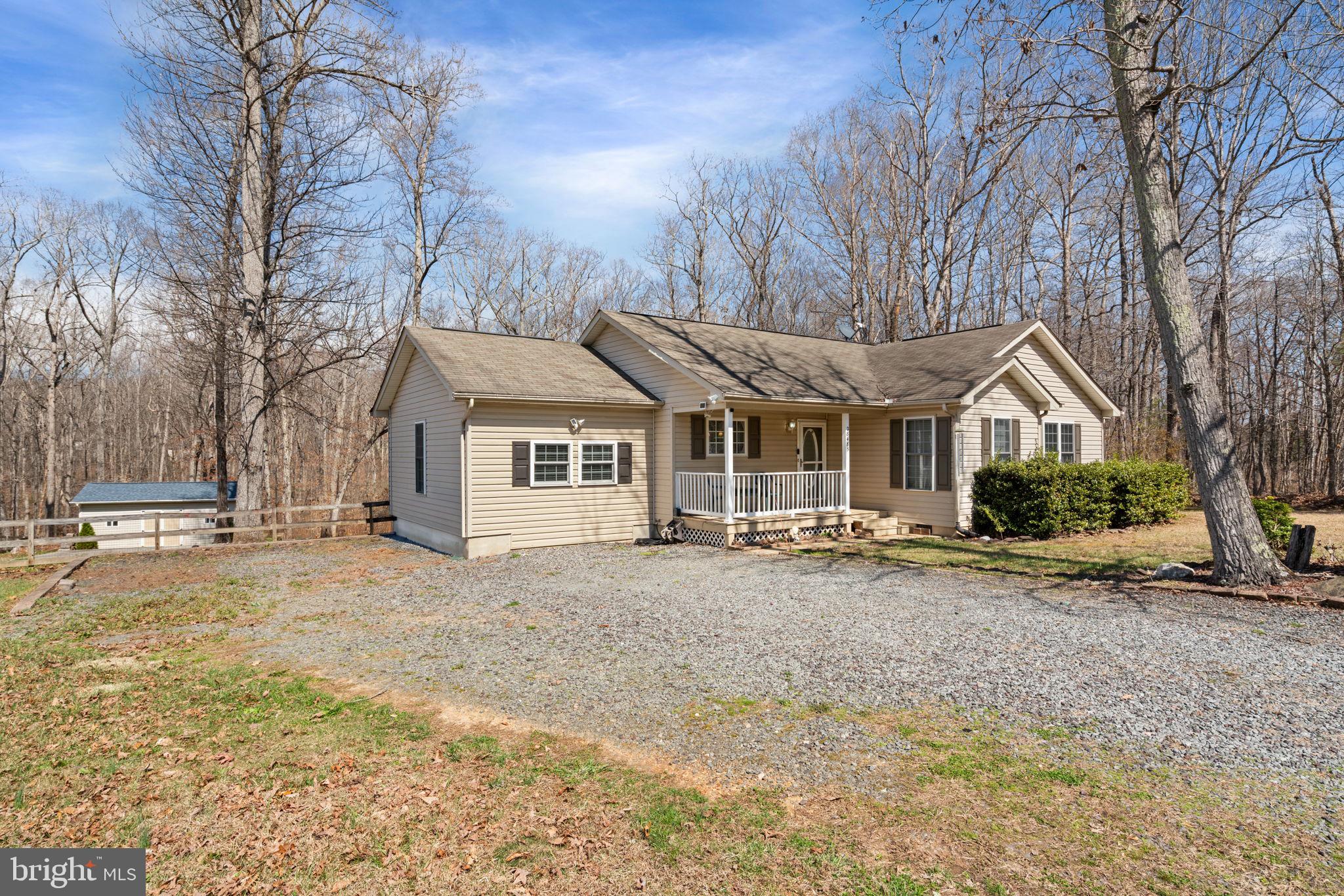 28485 Morel Way Rhoadesville, VA 22542 - Photo 4 of 42 a view of a house with a yard and large tree