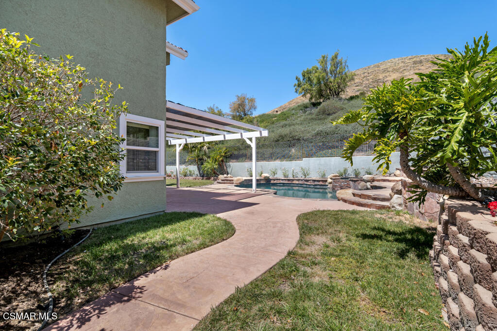 5339 Seneca Place Simi Valley, CA 93063 - Photo 58 of 76 a view of a garden with a patio