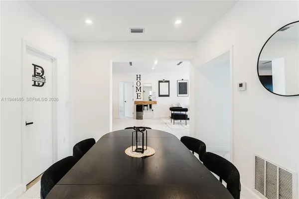 a bedroom with a bed and a closet