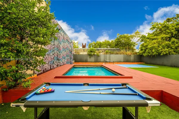 a view of wall paintings and a vase