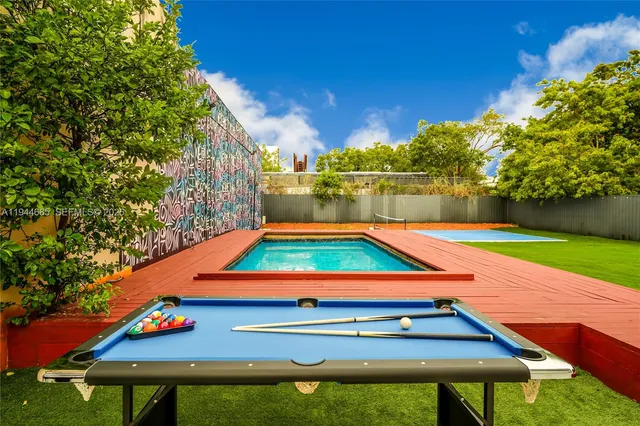 a view of wall paintings and a vase