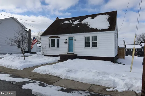 a view of backyard of house