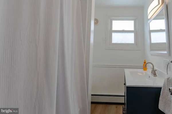 a white refrigerator freezer sitting inside of a kitchen
