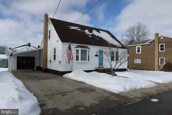 a view of a house with a patio