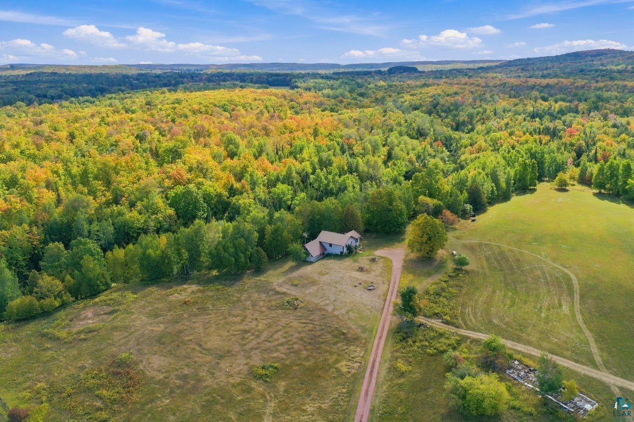 65889 Old County Road Marengo, WI 54855 - Photo 38 of 44 Expansive natural landscape with varied foliage and open fields