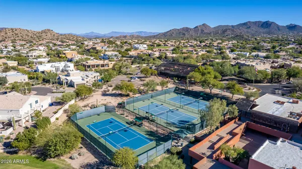 an aerial view of a houses with outdoor space