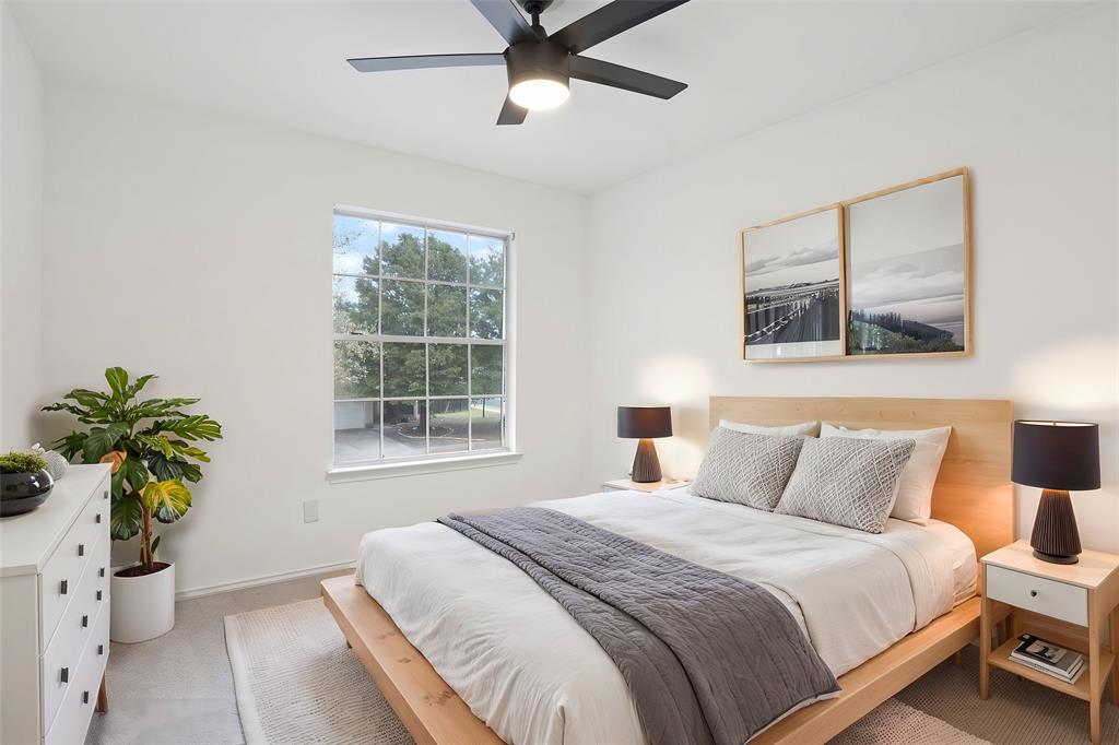 4429 East Hove Loop Austin, TX 78749 - Photo 20 of 27 a bedroom with a bed and a potted plant