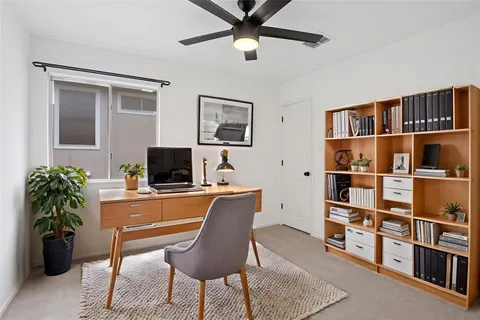 a workspace with a bookshelf