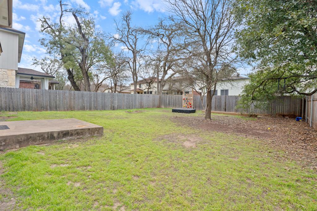 4429 East Hove Loop Austin, TX 78749 - Photo 26 of 27 a view of a backyard with large trees