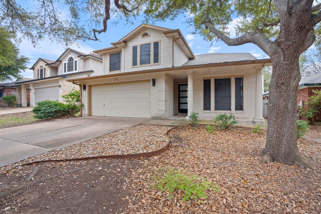 4429 East Hove Loop Austin, TX 78749 - Photo 3 of 27 front view of a house with a yard