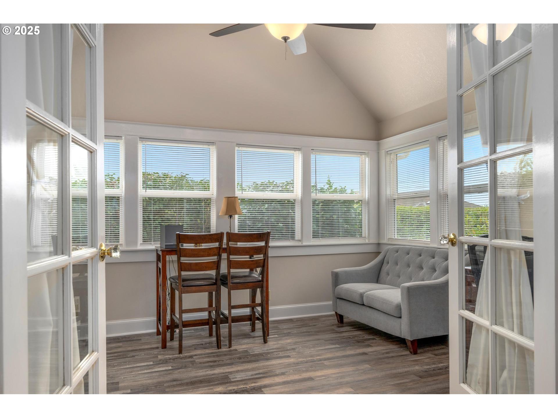 8918 Southwest Grabhorn Road Beaverton, OR 97007 - Photo 14 of 46 a living room with furniture and a large window
