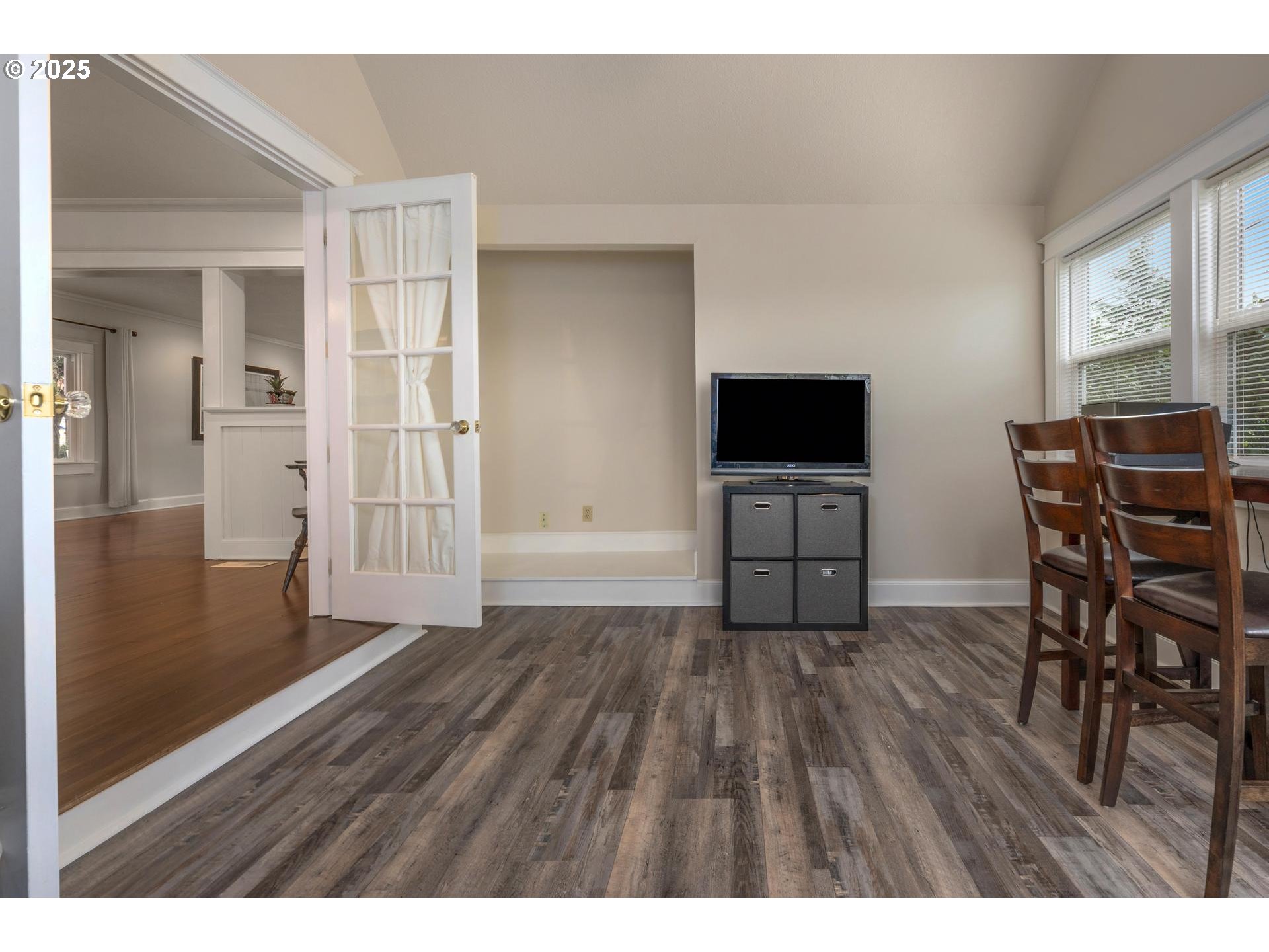 8918 Southwest Grabhorn Road Beaverton, OR 97007 - Photo 15 of 46 a living room with furniture and a flat screen tv
