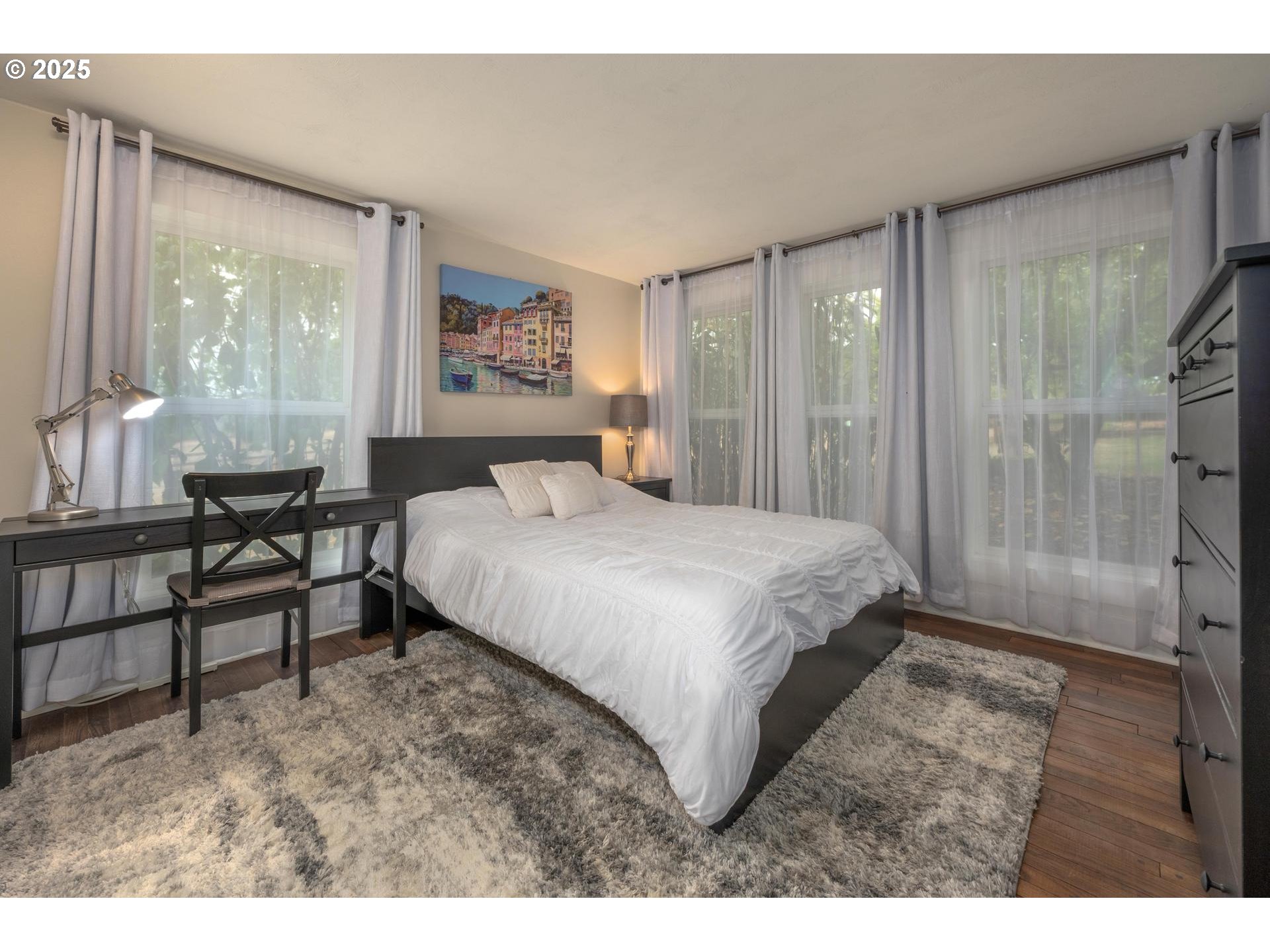 8918 Southwest Grabhorn Road Beaverton, OR 97007 - Photo 16 of 46 a bedroom with a bed and a window