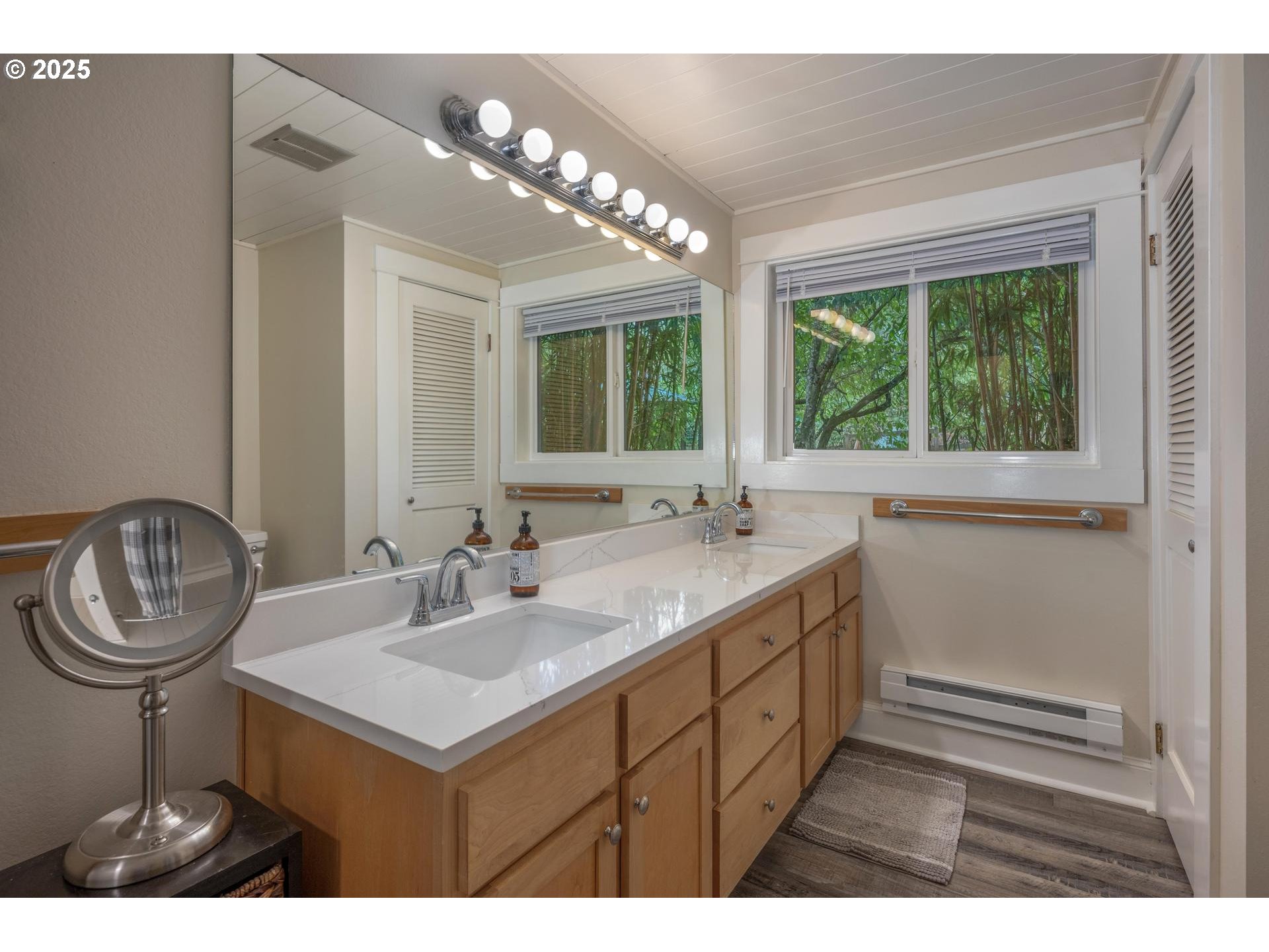 8918 Southwest Grabhorn Road Beaverton, OR 97007 - Photo 19 of 46 a bathroom with a sink and a mirror