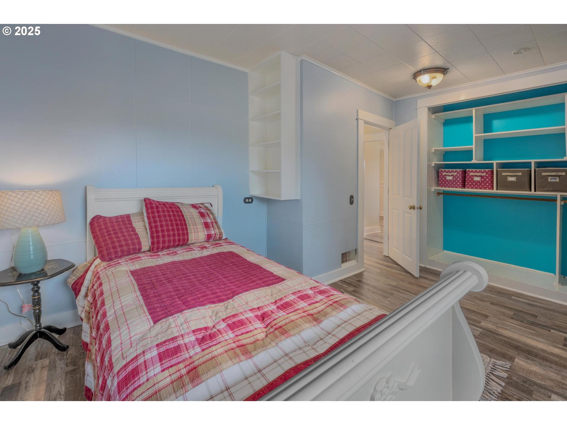 8918 Southwest Grabhorn Road Beaverton, OR 97007 - Photo 21 of 46 a bedroom with a bed and a dresser