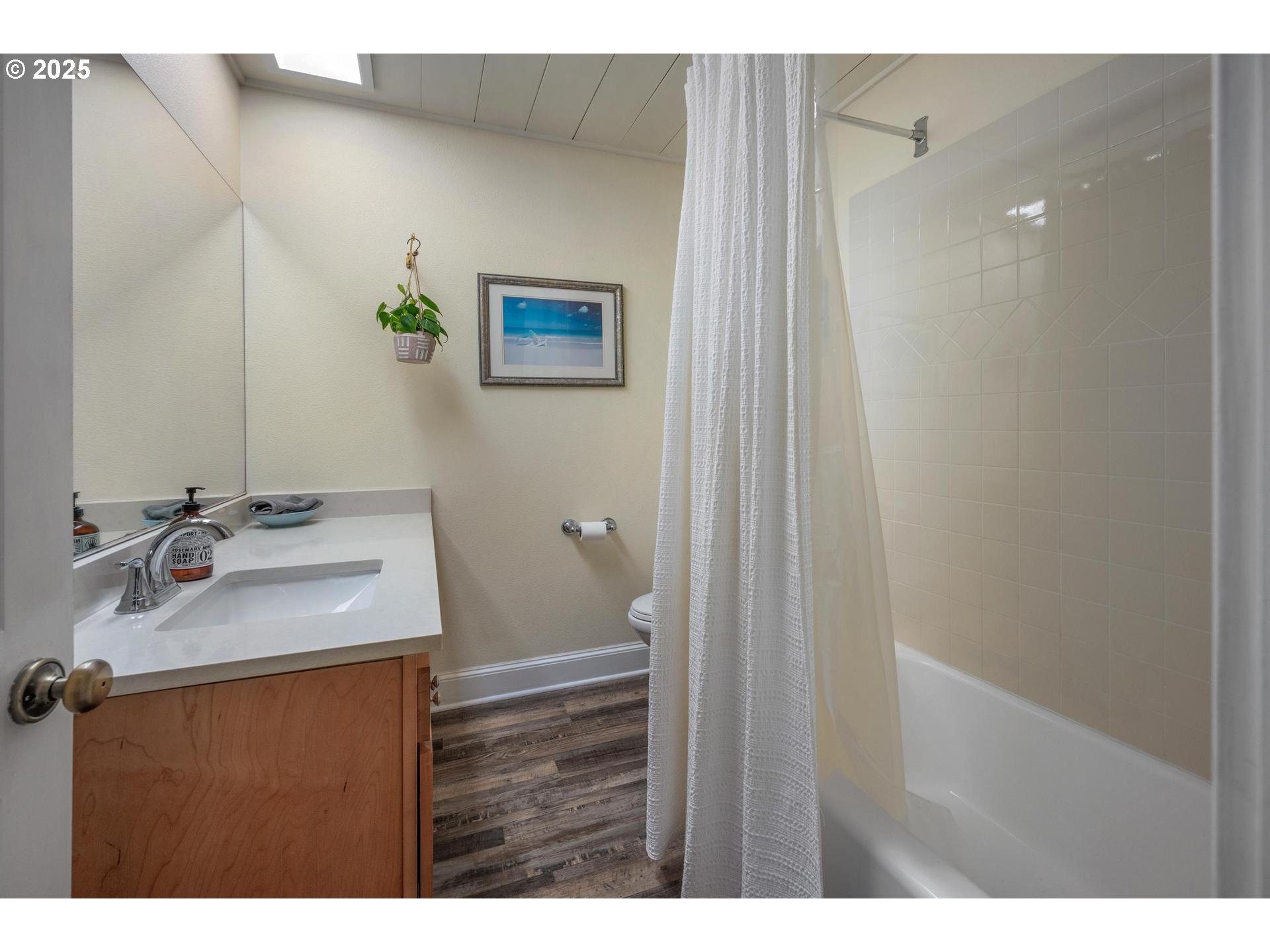 8918 Southwest Grabhorn Road Beaverton, OR 97007 - Photo 22 of 46 a bathroom with a sink vanity and a mirror