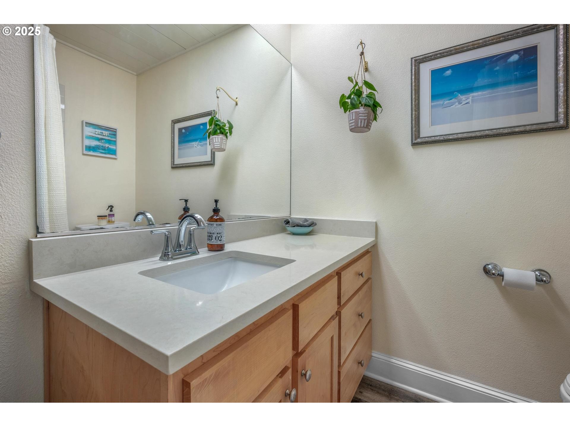 8918 Southwest Grabhorn Road Beaverton, OR 97007 - Photo 23 of 46 a bathroom with a sink and a mirror