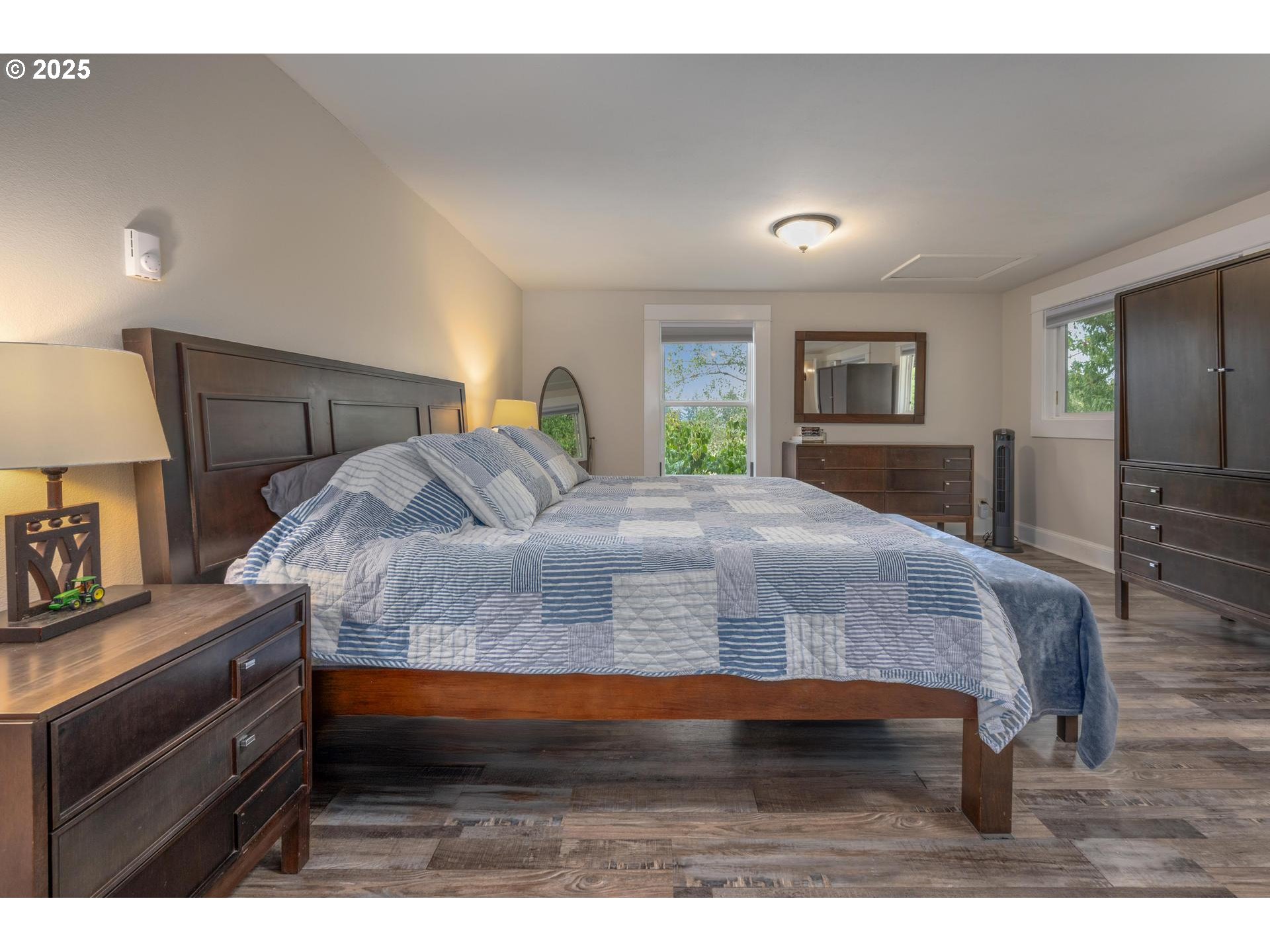 8918 Southwest Grabhorn Road Beaverton, OR 97007 - Photo 25 of 46 a bedroom with a bed and a dresser