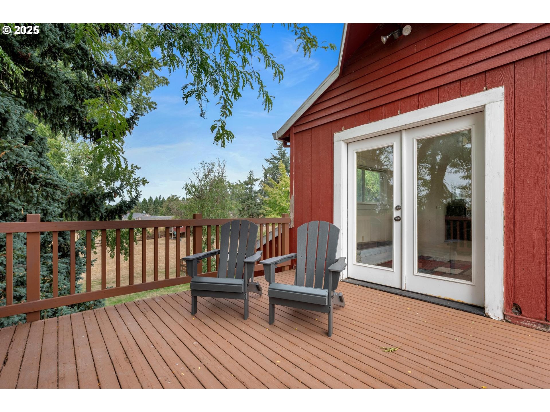 8918 Southwest Grabhorn Road Beaverton, OR 97007 - Photo 32 of 46 a terrace with outdoor seating