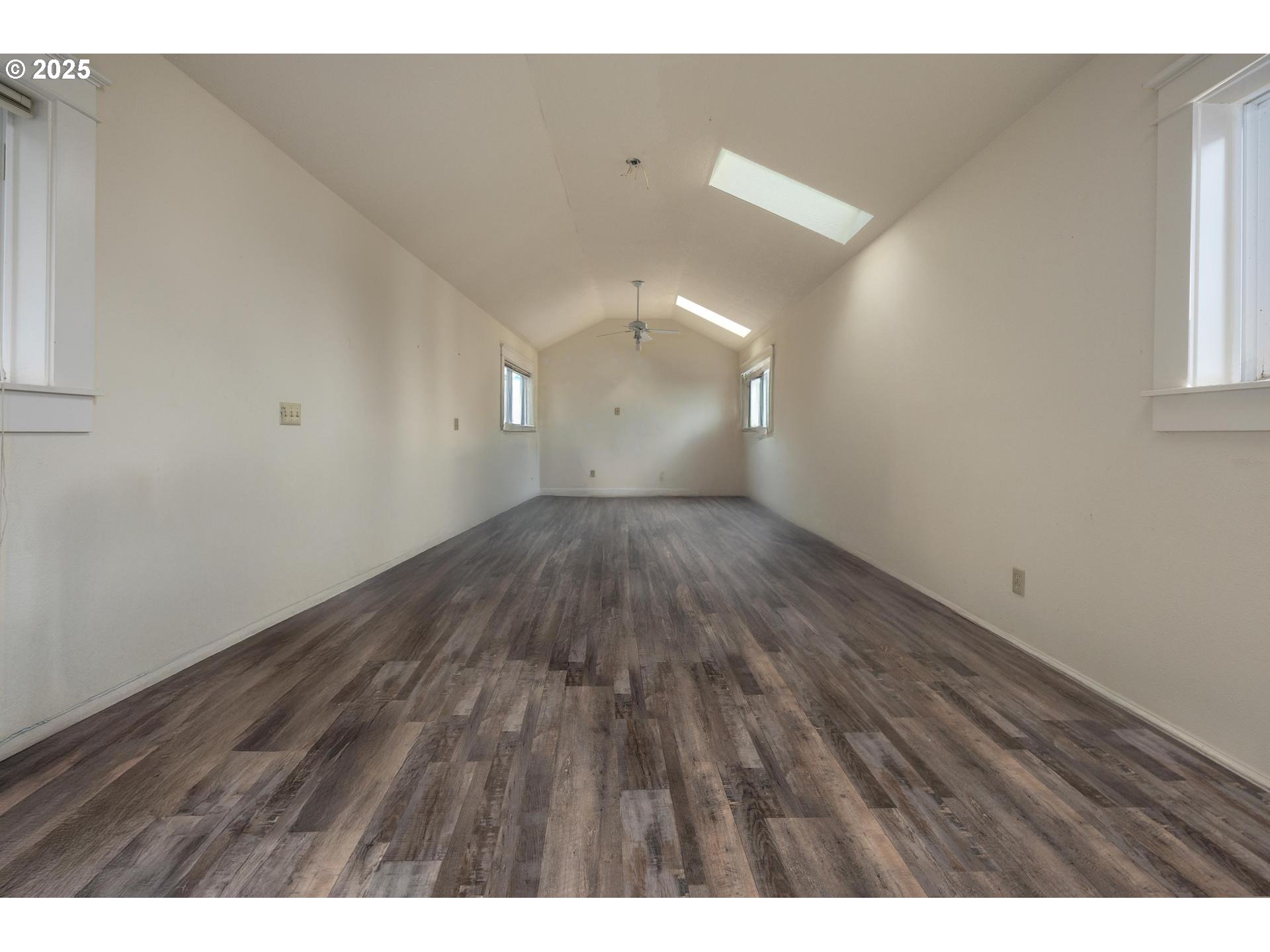 8918 Southwest Grabhorn Road Beaverton, OR 97007 - Photo 34 of 46 a view of an empty room and window