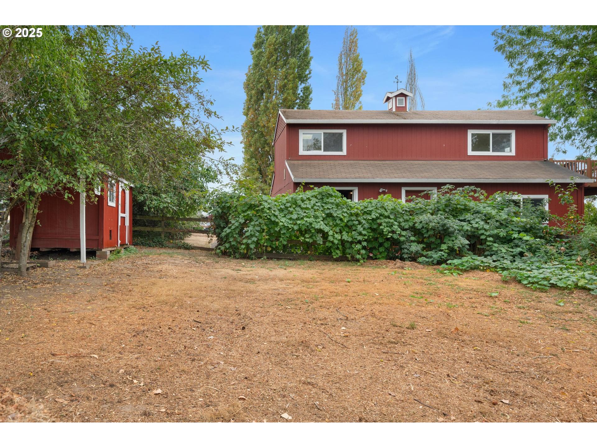 8918 Southwest Grabhorn Road Beaverton, OR 97007 - Photo 36 of 46 a view of a house with a backyard