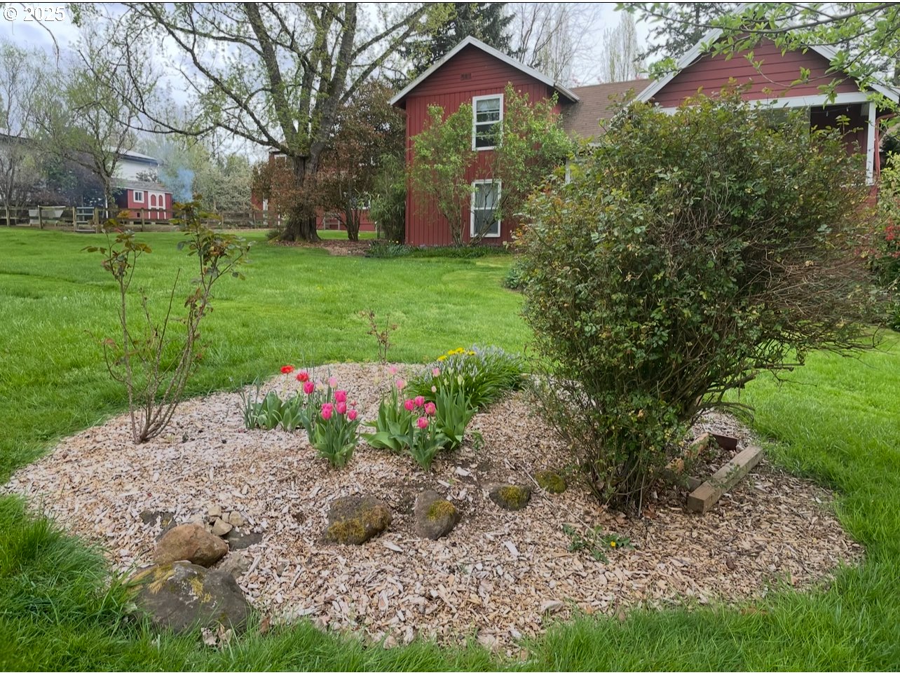 8918 Southwest Grabhorn Road Beaverton, OR 97007 - Photo 43 of 46 a front view of a house with a yard and garage