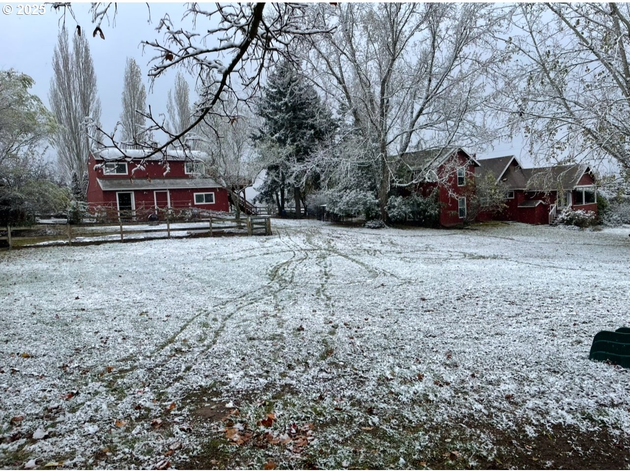 8918 Southwest Grabhorn Road Beaverton, OR 97007 - Photo 45 of 46 a view of a house with large trees