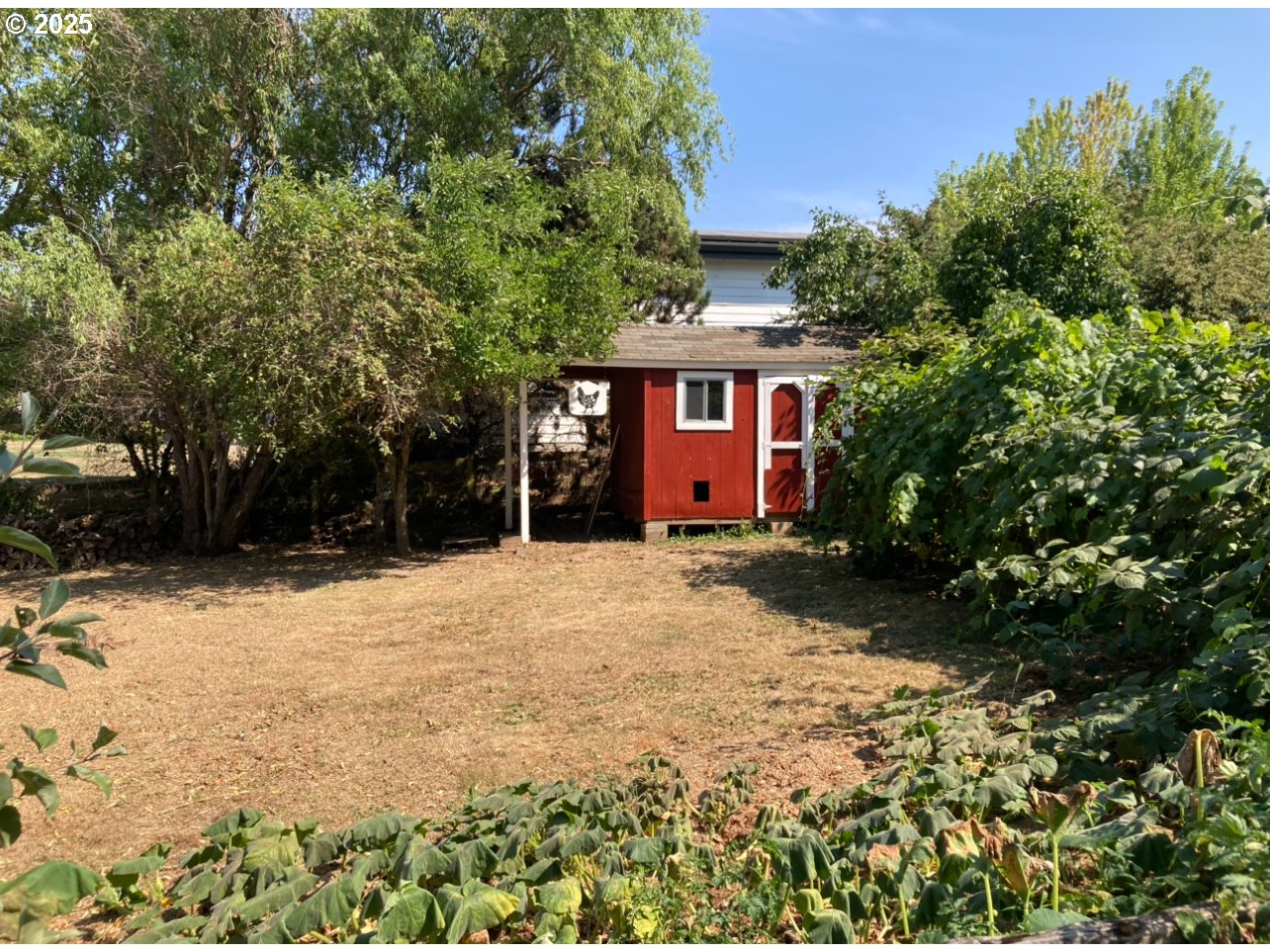 8918 Southwest Grabhorn Road Beaverton, OR 97007 - Photo 46 of 46 front view of a house with a yard