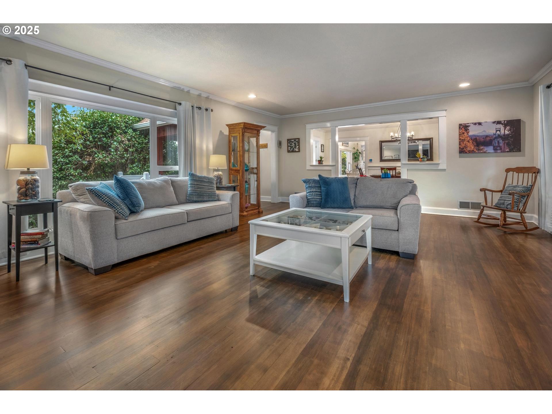 8918 Southwest Grabhorn Road Beaverton, OR 97007 - Photo 5 of 46 a living room with furniture and a large window