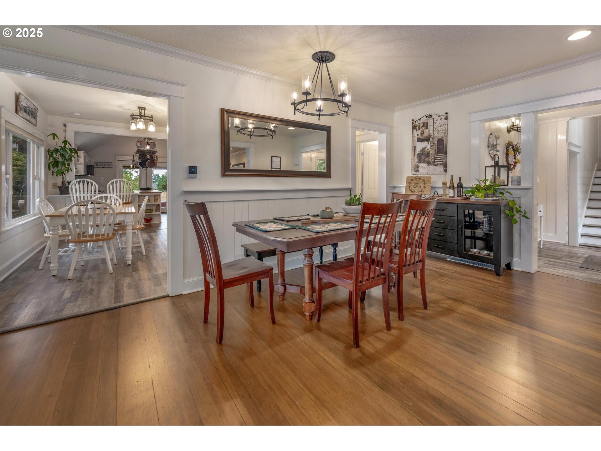 8918 Southwest Grabhorn Road Beaverton, OR 97007 - Photo 7 of 46 a dining room with furniture window and wooden floor