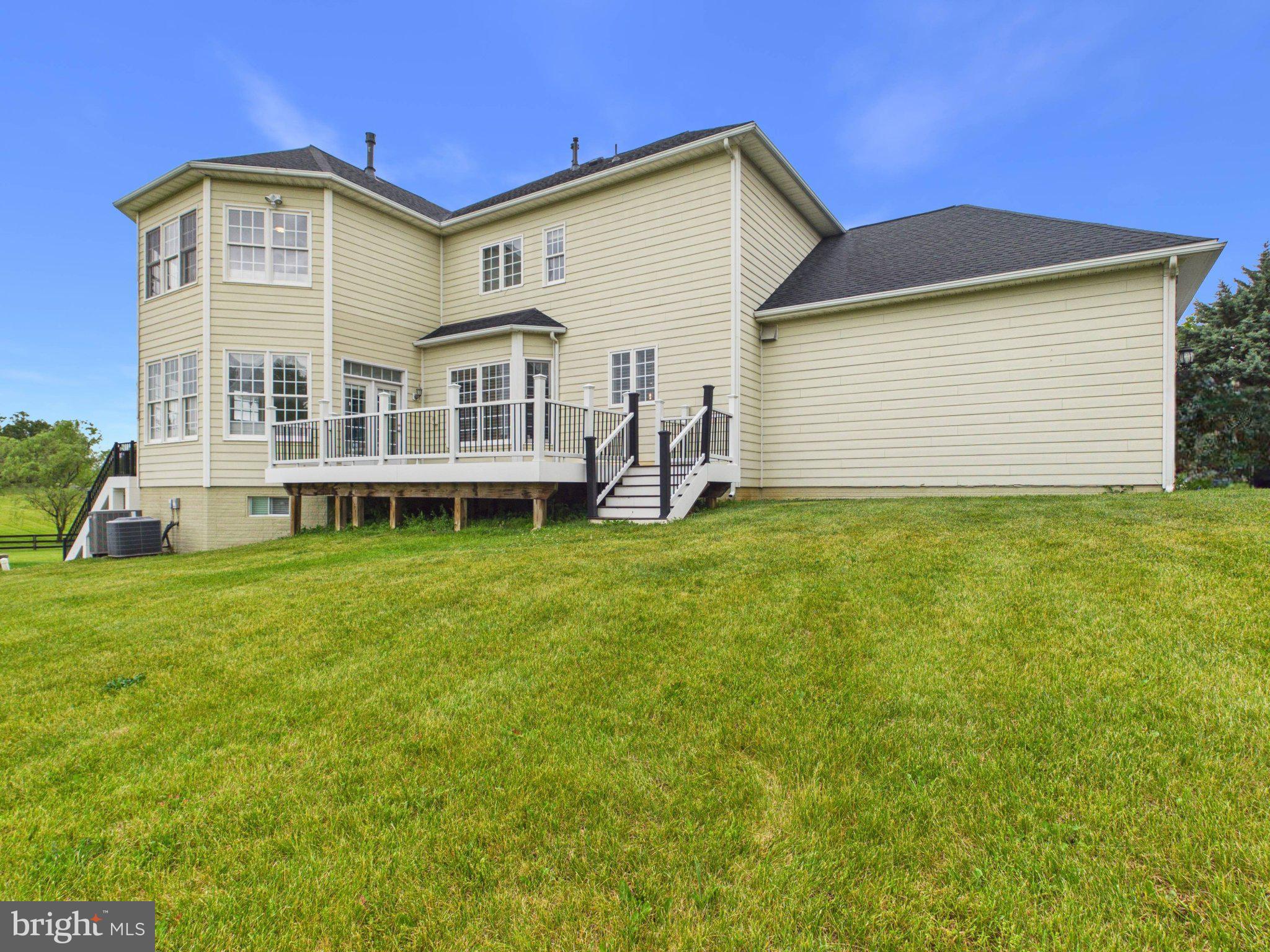 38565 Piggott Bottom Road Hamilton, VA 20158 - Photo 65 of 85 a front view of a house with a yard