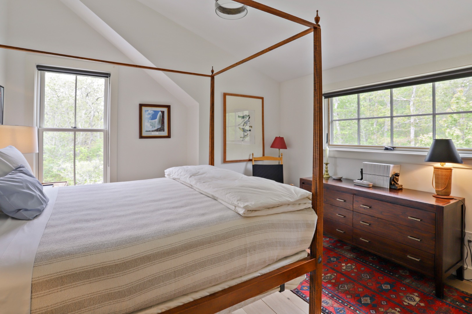 9 Ridge Hill Road Chilmark, MA 02535 - Photo 34 of 48 a bedroom with a bed and a large window