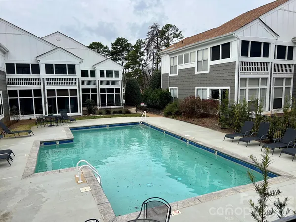 a front view of a house with swimming pool