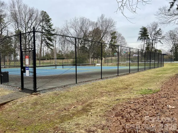 a view of a park with swings