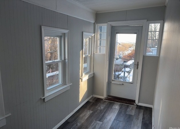 13 Merchant Street Worcester, MA 01603 - Photo 7 of 17 an empty room with windows