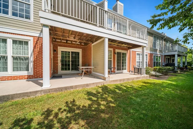 front view of a building with a yard