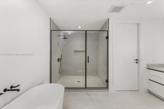 a bathroom with a sink and vanity